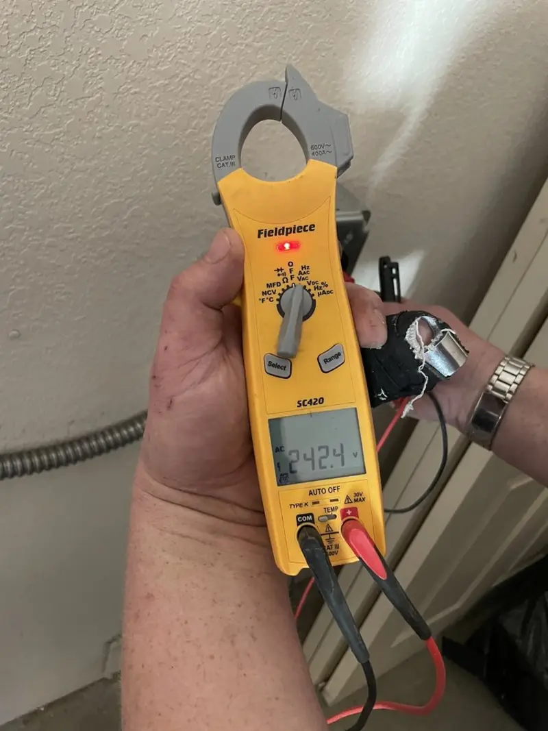 Voltage testing with clamp meter during Electrical Installation Services in Joshua Tree